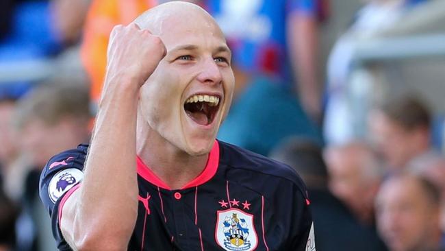 Aaron Mooy in action for Huddersfield.