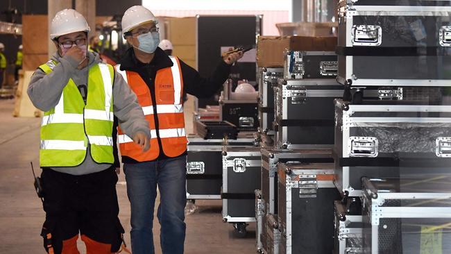 Workers inside the Mobile World Congress venue in Barcelona. Picture: AFP