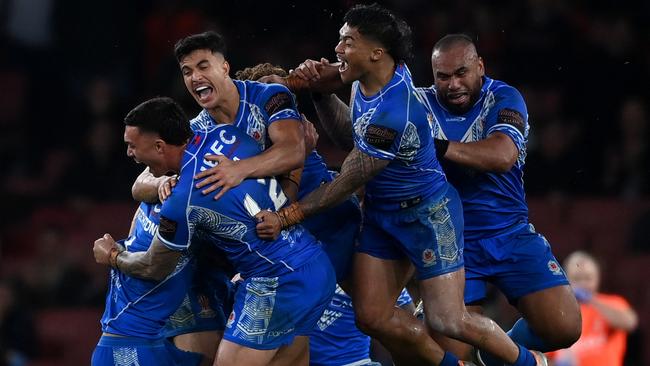 Samoa celebrates after Stephen Crichton kicks the winning golden point drop goal. Photo by Gareth Copley/Getty Images.