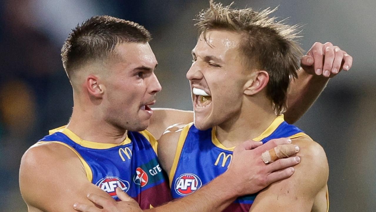 Darcy Wilmot and Kai Lohmann of the Lions celebrate during the 2023 AFL Round 14 match between the Brisbane Lions and the Sydney Swans at the Gabba on June 16, 2023 in Brisbane, Australia. (Photo by Russell Freeman/AFL Photos via Getty Images)