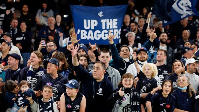 Blues fans celebrate the win against North Melbourne on Good Friday. Picture: Dylan Burns/AFL Photos via Getty Images