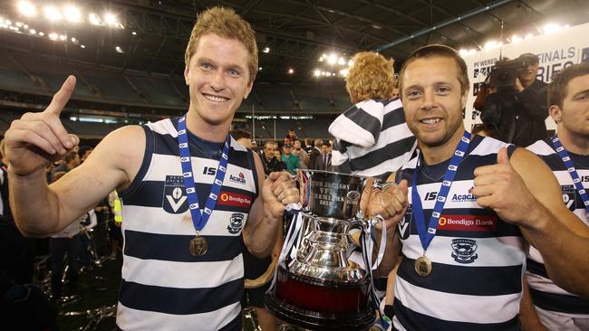 Captain Troy Selwood and David Wojcinski after a game between Port Melbourne and Geelong at Etihad Stadium.