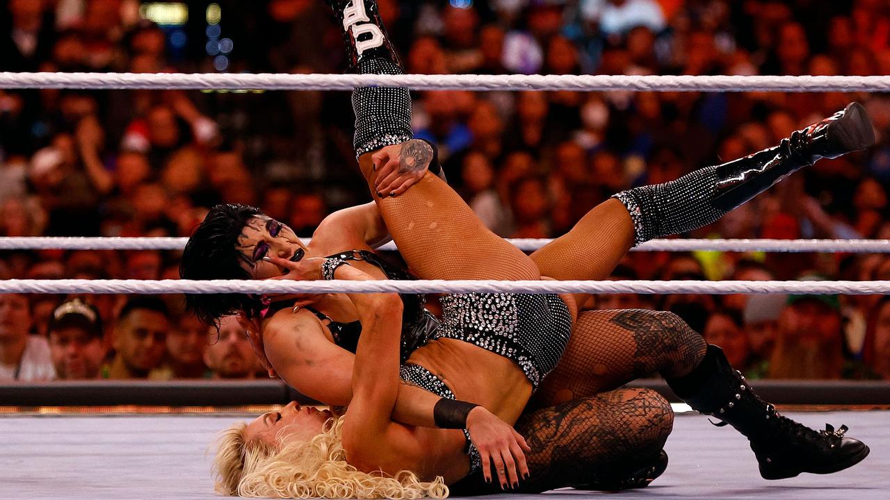 Rhea Ripley and Charlotte Flair wrestle for the Smackdown women’s championship at WrestleMania. Photo: Ronald Martinez/Getty Images/AFP