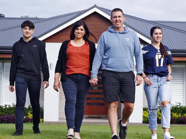 24/3/22 WEEKEND TELEGRAPH SPECIAL. MUST NOT USE BEFORE CLEARING WITH PIC EDITOR JEFF DARMANIN. Rebecca Mitchell, husband Justin Mitchell, daughter Tahlia, 16, and son Jacob, 14 pictured at their Luddenham home today. Picture: Sam Ruttyn