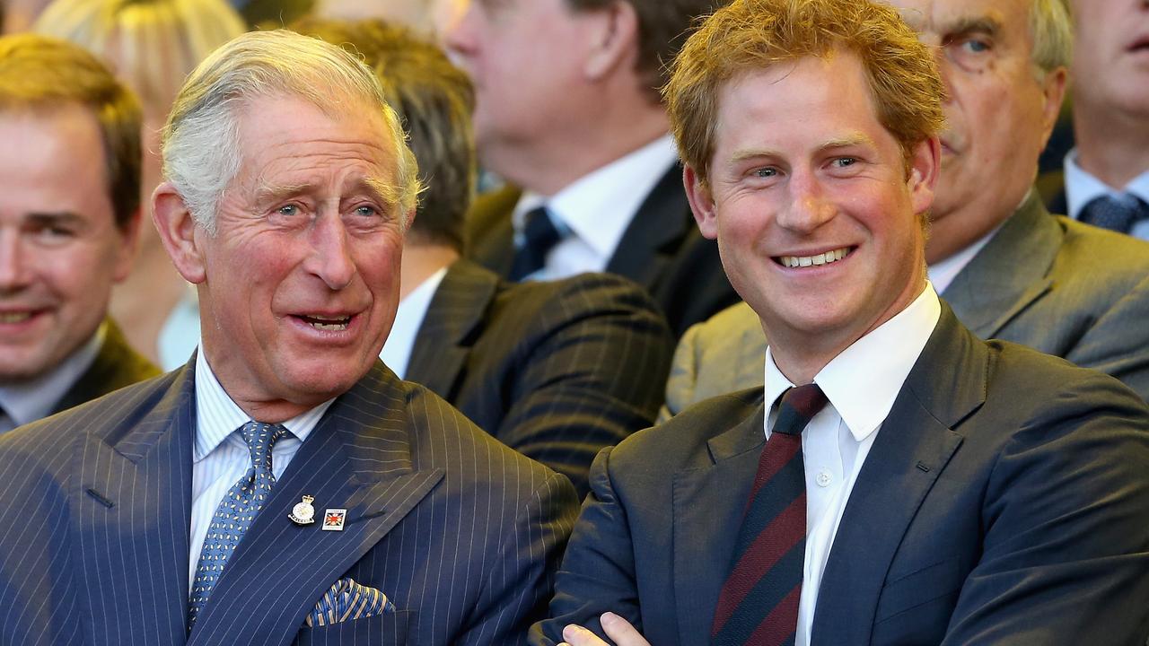 Prince Charles and Prince Harry laugh during the Invictus Games Opening Ceremony on September 10, 2014. Picture: Chris Jackson/Getty Images