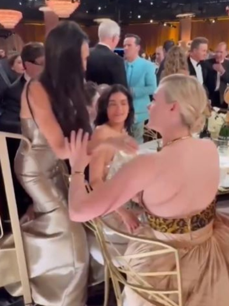 Awkward video has emerged that appears to show Demi Moore completely ignoring Kylie Jenner at the Golden Globes ceremony. Picture: X