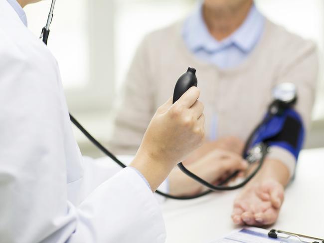 medicine, age, health care and people concept - close up of doctor with tonometer checking senior woman blood pressure level at hospital. Finding someone to care for elderly relatives can be hard. For Good Life wk 46