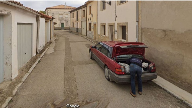 A Google Street View image of a man loading a large white plastic bag into the boot of his car has led to the arrest of two people on suspicion of murder. Picture: Google