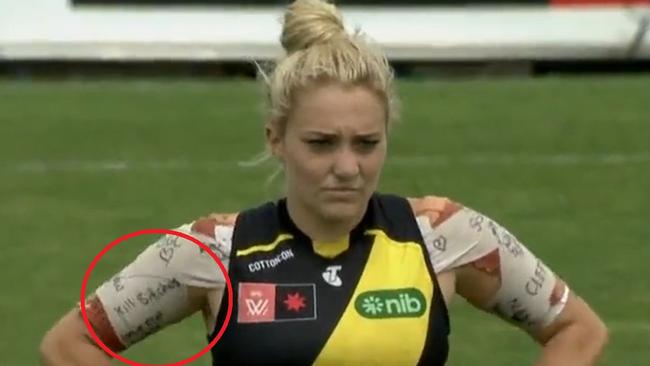 Richmond's Jess Hosking with messages written on her shoulder tape.