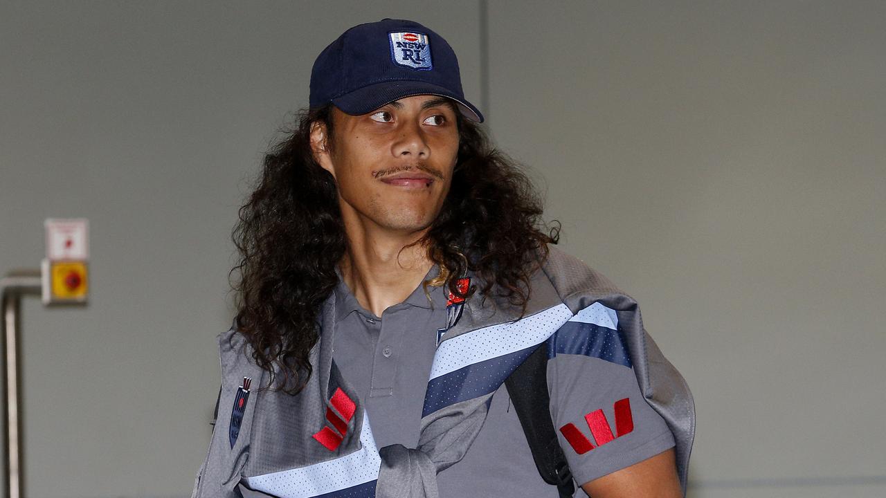 Jarome Luai at Sydney Airport. The NSW Blues Rugby League Team arrive at Sydney Airport, after losing the game and the State of Origin series against Queensland in game two played in Brisbane. Picture: John Appleyard