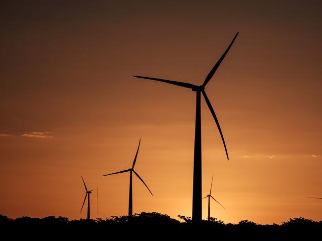 Wind turbines are seen at Vamcruz Windfarm, developed by three energy companies including French renewable energy power plants operator Voltalia Group, on June 29, 2016, in Serra do Mel, Rio Grande do Norte State, Brazil. Vamcruz Windfarm Complex was inaugurated with 31 wind turbines, which have the potential to supply 200,000 families with energy. / AFP PHOTO / YASUYOSHI CHIBA
