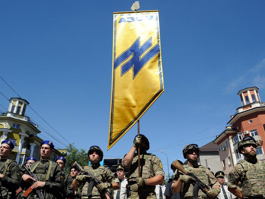 Azov Battalion members march through Mariupol in 2019. Picture: Evgeniya Maksymova/AFP