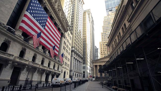 The Fearless Girl statue stands nearly alone in front of the New York Stock Exchange near Wall Street. Picture: AFP.