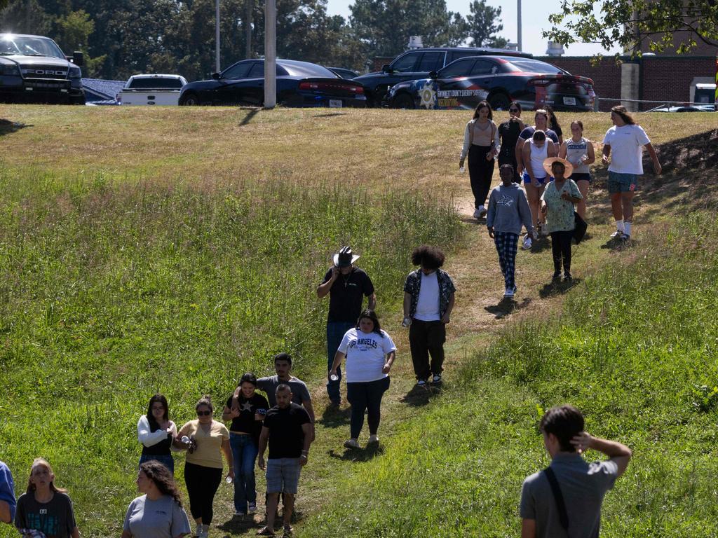 Parents and students leave the scene after being reunited after a shooting took place at Apalachee High School in Winder, Georgia. Picture: AFP