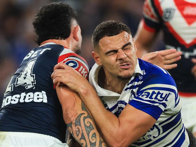 SYDNEY, AUSTRALIA - MAY 16: Jacob Kiraz of the Bulldogs is tackled during the round eleven NRL match between Bulldogs and Roosters at Accor Stadium, on May 16, 2025, in Sydney, Australia. (Photo by Mark Evans/Getty Images)