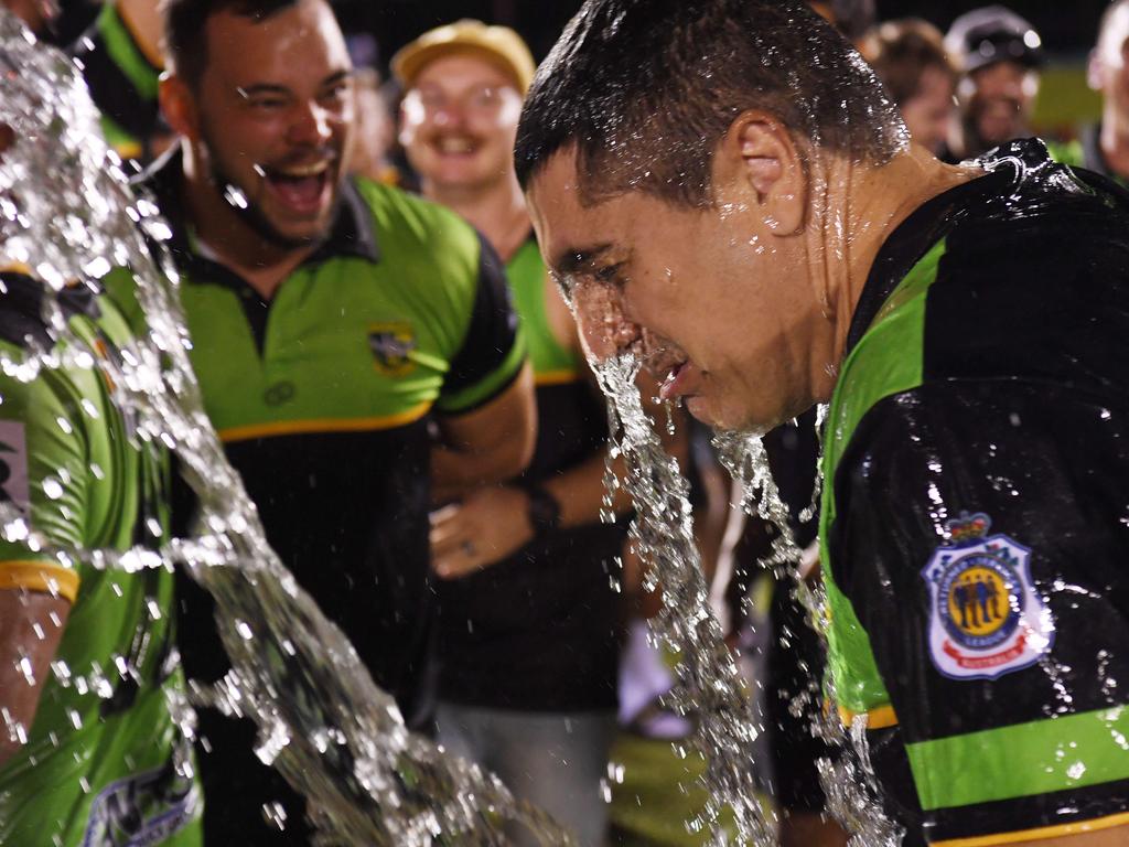 Palmerston Raiders classic gatorade dump on coach Merg Mikaelian as they celebrate winning the NRLNT Grand Final 2022. Picture: (A)manda Parkinson