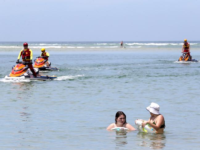 Holiday makers Pictured enjoying the Tallebudgera Crk while Life Guards watch over them.   Picture Mike Batterham