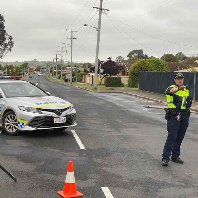 Police on the scene of an alleged shooting in Devonport. Photo: Grant Wells