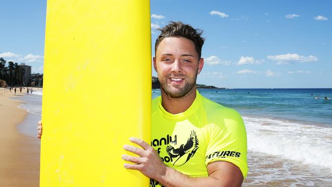 Ricci Guarnaccio from TV show Geordie Shore surfed at Manly Beach. Picture: Braden Fastier