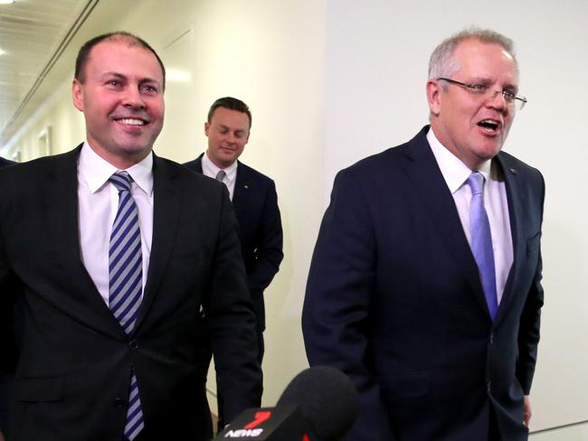 PM elect Scott Morrison, right, leaves the party room with Josh Frydenberg after winning today's party vote. Picture: Ray Strange