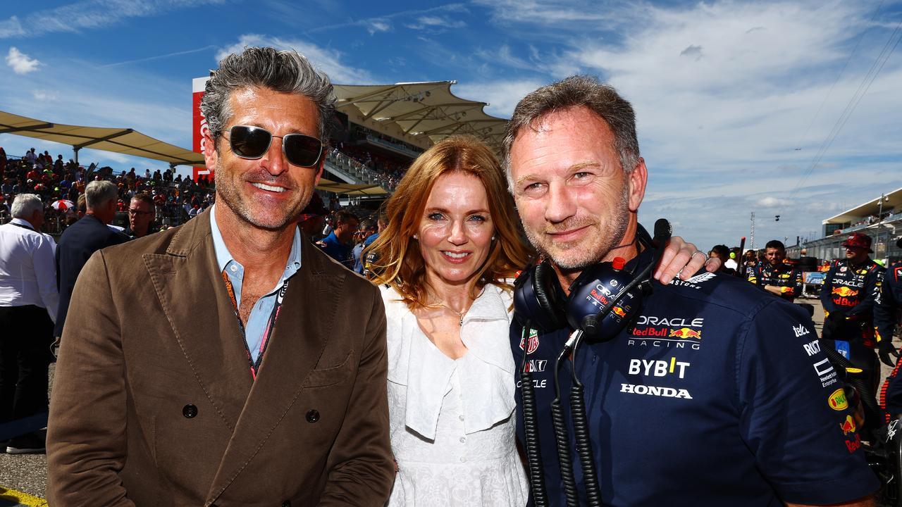 The Horners pose with Patrick Dempsey at the US GP. Photo by Mark Thompson/Getty Images