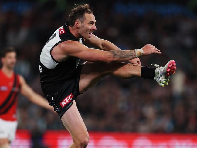 Finlayson launches Port Adelaide forward against the Bombers. Picture: James Elsby/AFL Photos via Getty Images