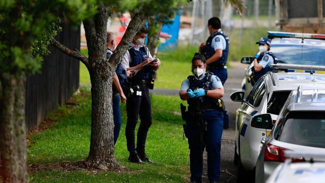 At least six police cars and armed officers have descended on an address on Virgo Place in the suburb, while an Eagle helicopter is also circling the area. Picture: Alex Burton