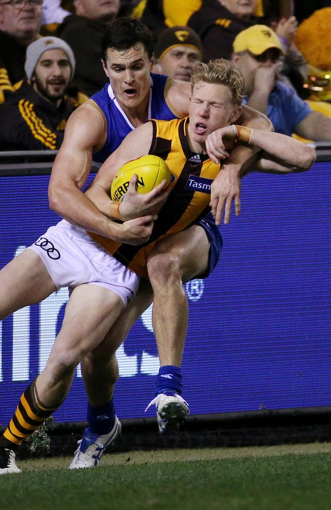 Hawk forward James Sicily gets a free kick for a high tackle. Picture: Colleen Petch