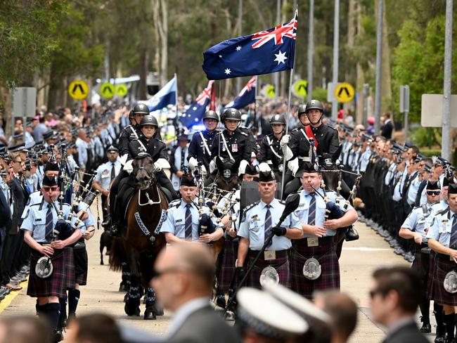 Constables Rachel McCrow and Matthew Arnold were farewelled with a police guard of honour after they were killed in the shooting in rural Queensland. Picture: Bradley Kanaris/Getty Images