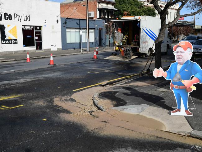 But here he is at a burst water main on Gilbert St, Adelaide, on Saturday. Picture: Campbell Brodie.