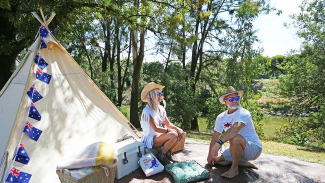 Vicki Connors and Steve Robinson set up camp alongside the Peel River during the Tamworth Country Music Festival on January 26. Picture: Getty Images