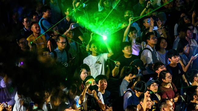 Protesters point lasers during a demonstration in Hong Kong in the latest opposition to a planned extradition law that has quickly evolved into a wider movement for democratic reforms. Picture: Philip Fong/AFP