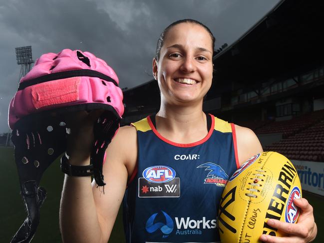 Adelaide Crows footballer Heather Anderson has been given permission to wear a pink helmet during the football games.