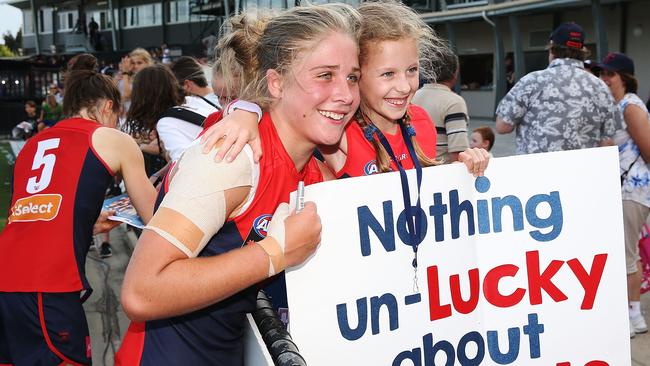 Katherine Smith of the Demons meets a fan. (Pic: Michael Dodge/Getty)