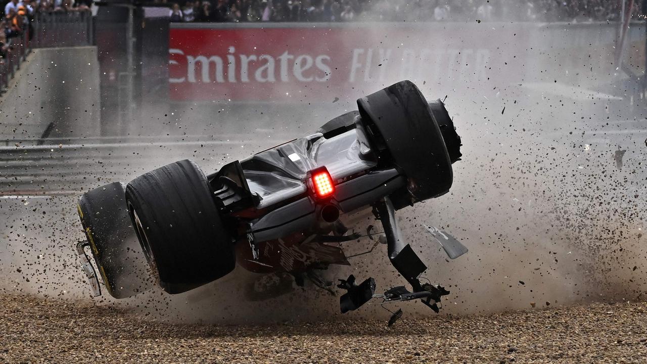 Into the gravel upside down. (Photo by Ben Stansall / AFP)