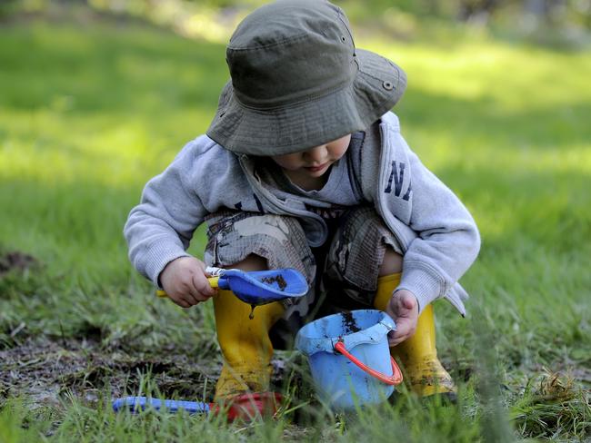 Make some mud pies at a school holiday nature play session.