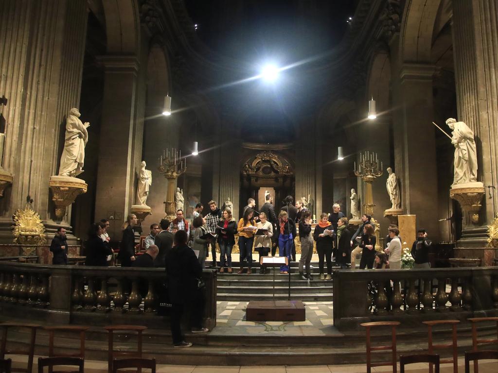 Members of the Notre Dame cathedral choir rehearse at the Saint Sulpice church in Paris. Picture: AP Photo/Michel Euler