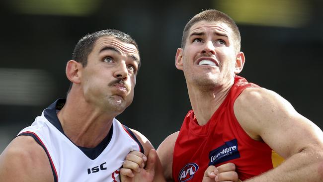 AFL – Adelaide Crows v Gold Coast at Noarlunga Oval. T Taylor Walker contests the boundary throw in with Zac Smith SARAH REED