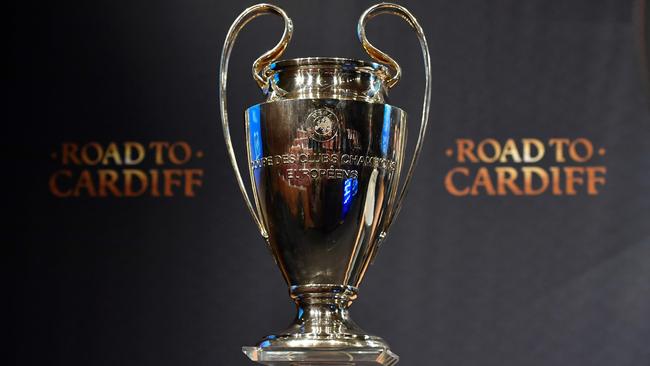 The UEFA Champions League cup is pictured prior to the ceremony for the quarter-final draw.