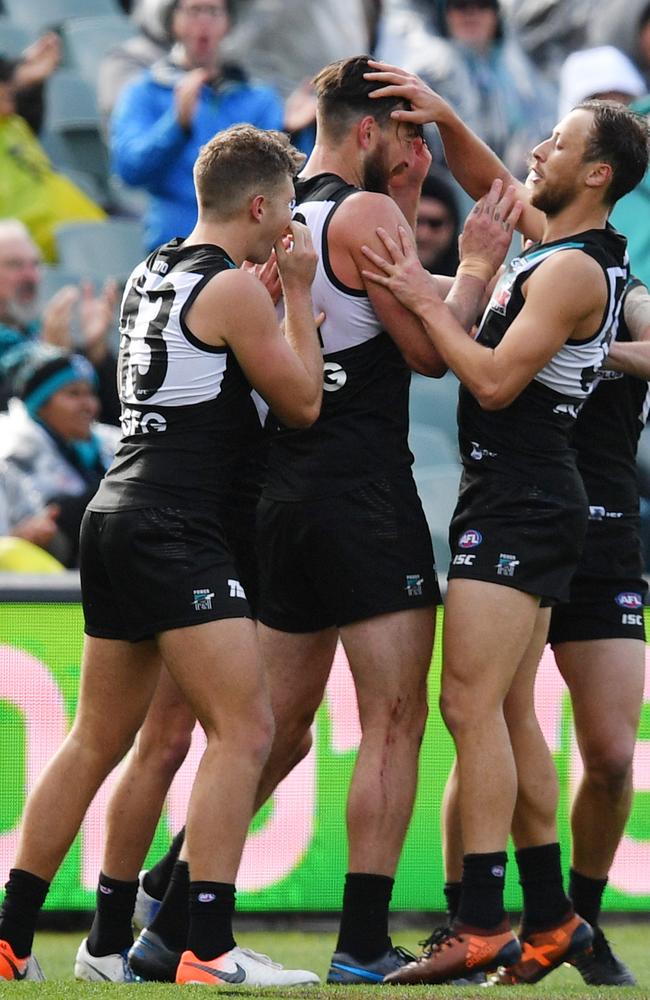 Tom Rockliff says Dixon is a barometer for his team. Picture: David Mariuz (AAP)