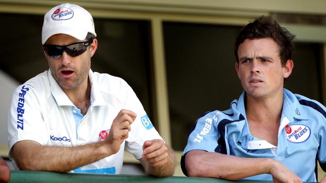 Simon Katich and Steve O'Keefe during a Sheffield Shield game.