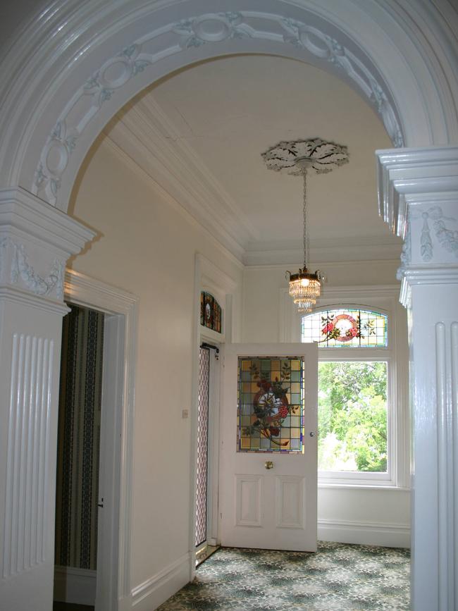 The interior and front entrance of the 1897 home.