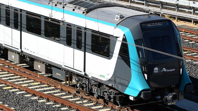 A Metro train seen approaching the Metro stabling yard, similar to what will be built at Clyde. (AAP Image/Joel Carrett)