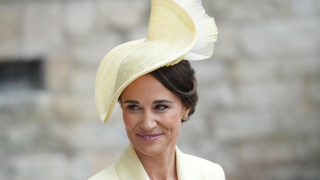 Pippa Middleton wears the Claire Mischevani ‘Alais’ coat in a bespoke yellow shade with a matching headpiece by Jane Taylor. Picture: Getty Images