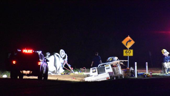 Fatal crash scene on Eton Homebush Rd near Eton. Two cars collided shortly before 6pm. A person, belileved to be a woman, was trapped in one of the vehicles. Picture: Tara Miko