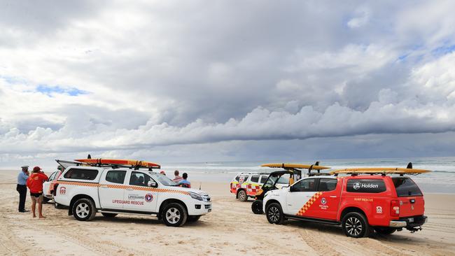 Emergency services gather on the beach. Picture: Scott Powick