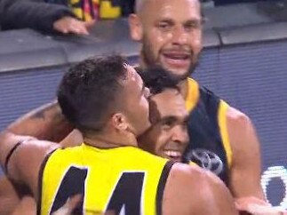 Eddie Betts and Sydney Stack celebrate