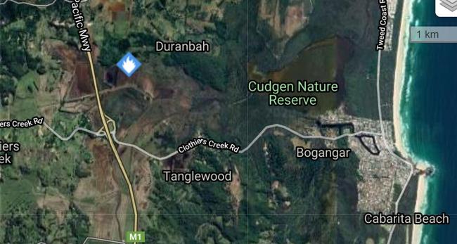 A fire is burning on the eastern side of the Pacific Hwy near Duranbah.