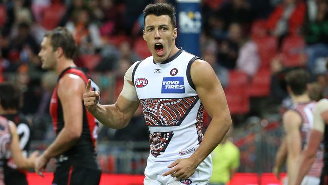 Dylan Shiel celebrates a goal against Essendon.