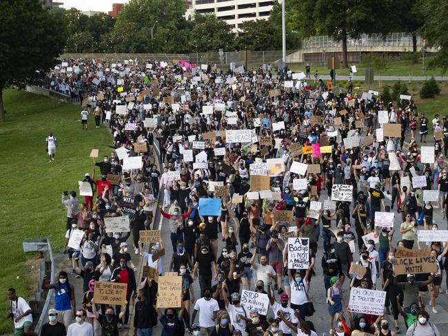 Activists fill Centennial Olympic Park Boulevard during a demonstration in Minneapolis. Picture: Atlanta Journal-Constitution via AP